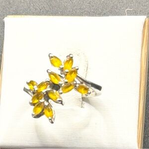 A Size 6 Vintage Sterling Silver bypass ring with 9 pretty Citrine stones